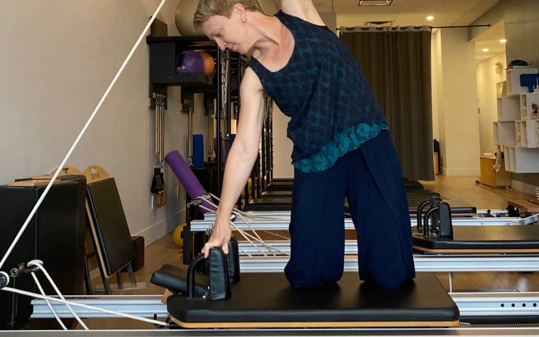 Pilates arm exercise on the Reformer
