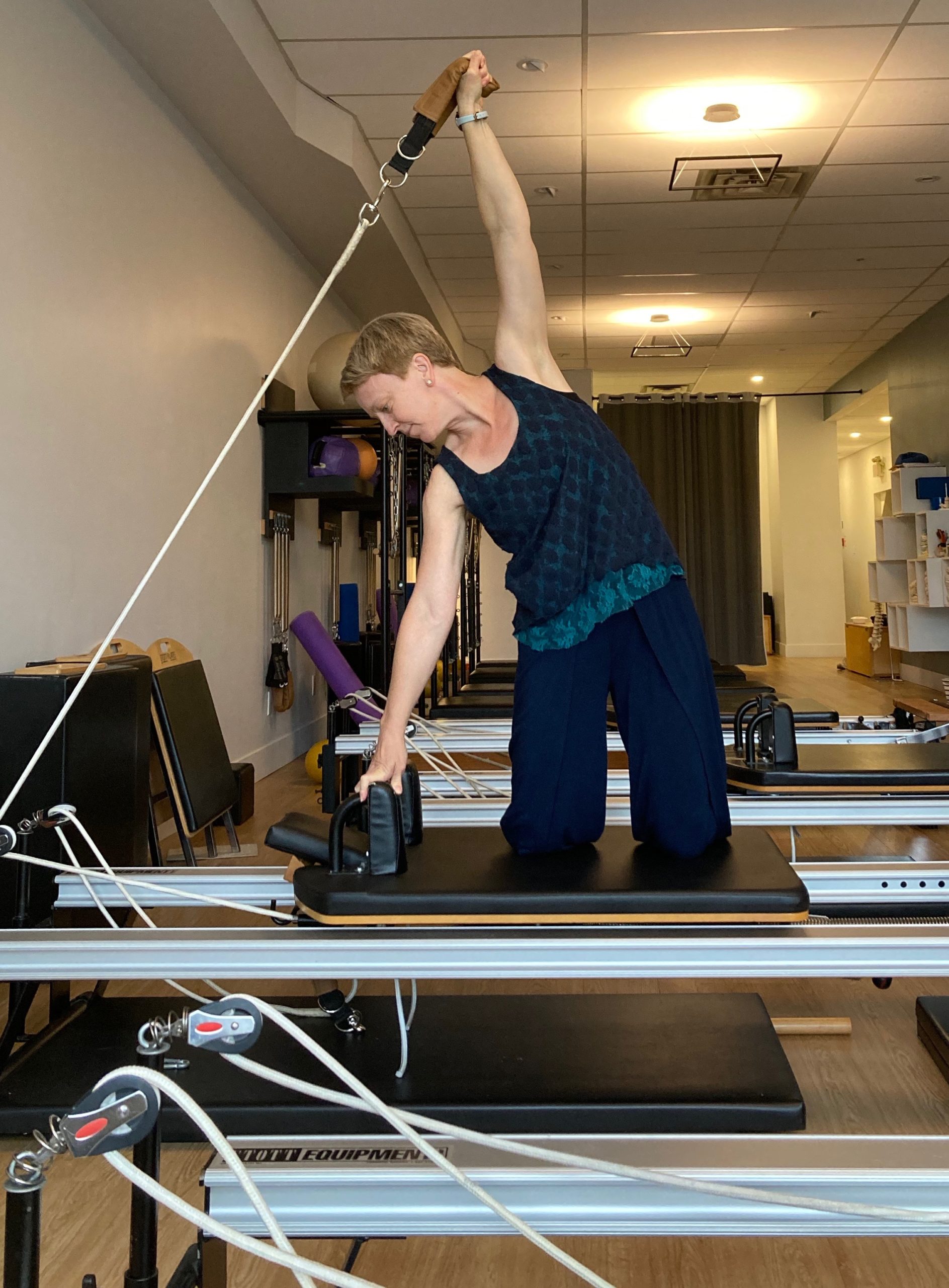 Pilates arm exercise on the Reformer