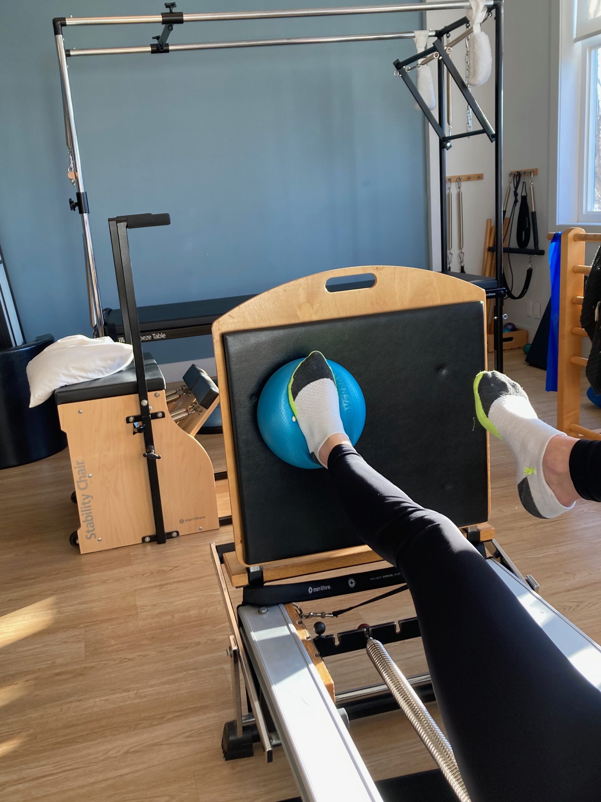 Footwork on Pilates Reformer. Jumpboard with Foot on Ball